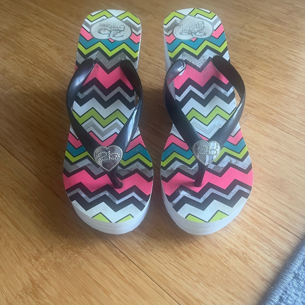 Bebe Chevron Flip Flops with Heart Detail
